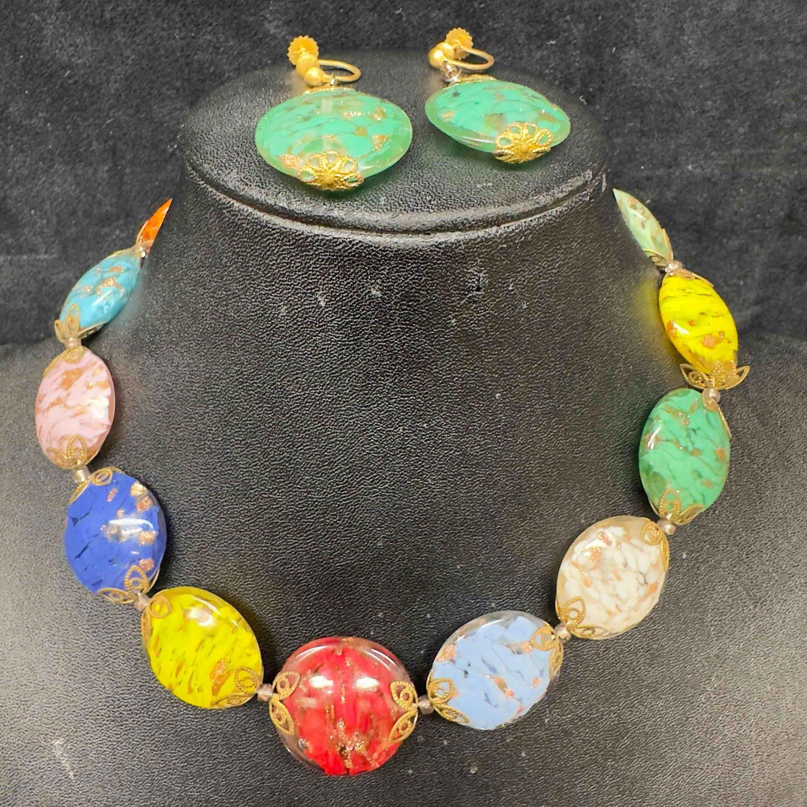 Murano Venetian Art Glass Lamp Work Multi Colored Circle Copper Beaded Necklace and Earrings Set C49: Murano Venetian Art Glass Lamp Work Multi Colored Circle Copper Beaded Necklace and Earrings Set C49. Necklace and earrings with multi colored glass beads with beautiful designs on each. The necklace