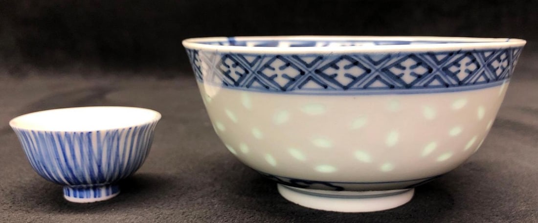Chinese "Rice Grain" Porcelain Bowl & Sake Cup: This lot contains Chinese Blue and White "Rice Grain" Porcelain Bowl and Sake Cup. The bowl is approx 4-1/2" x 4-1/2" x 2-1/4". The sake cup is approx 2" x 2" x 1". Com