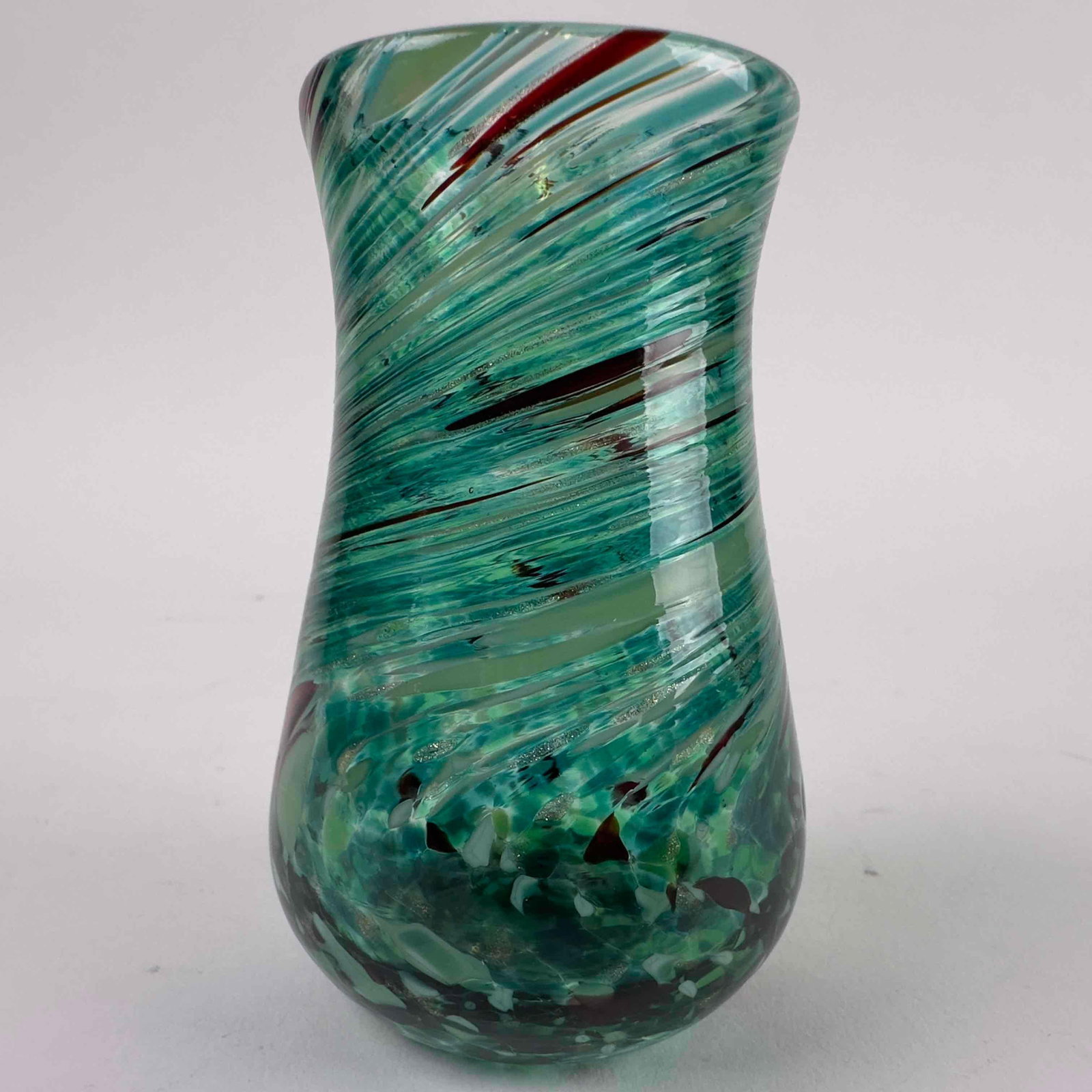 Murano Style Frosted Teal Emerald Oxblood Swirl Vase Hand Blown Art Glass Small: Murano Style Frosted Teal Emerald Oxblood Swirl Vase Hand Blown Art Glass Small. Etched initials marked "AQ 2022" underneath the vase. No chips or cracks, pre-owned in gently used condition wi