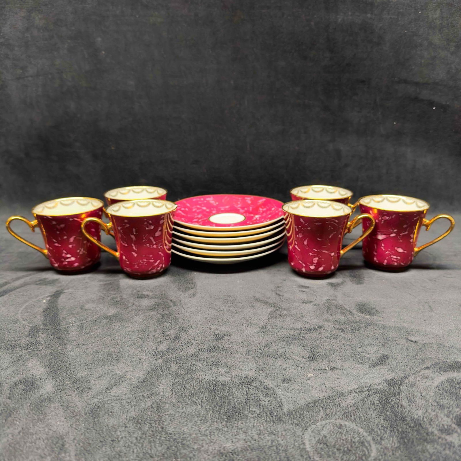 Hand Painted JSK Czech Czechoslovakia Red Gold Tea Cups and Small Plates Twelve 12 Dish Set: Hand Painted JSK Czech Czechoslovakia Red and Gold Tea Cups and Small Plates Twelve 12 Dish Set. This elegant raspberry red dish set includes six small plates with six teacups. Each piece has a beauti