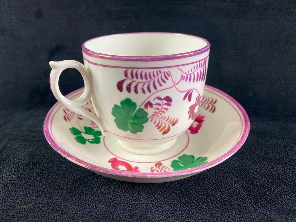 Antique Pink Lustreware Cup & Saucer: Antique Pink Lustreware Cup & Saucer Pink Lustreware porcelain cup and saucer from the early 1800s, made in England. These porcelain sets with the trademark pink pearlescent designs were popular a