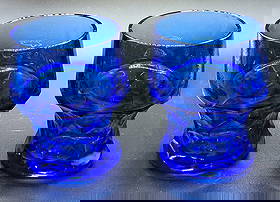 2 Vintage Georgian Blue Whiskey Glasses A: 2 Vintage Georgian Blue Whiskey Glasses A. Each is approximately 3" x 3" x 4" and the total weight is 1.26lb. The glasses have no chips or cracks. Please see the images as they are part of the descrip