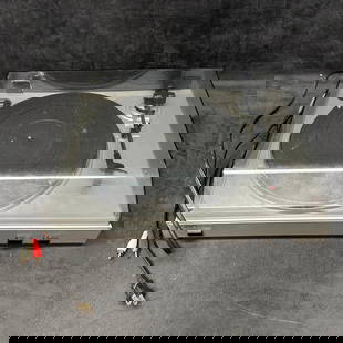 ION USB Turntable Model iTTUSB05 Tested One Hinge Repaired: ION USB Turntable, model iTTUSB05, designed for playing 33 and 45 RPM records with the option to convert vinyl to digital via USB. Comes with attached RCA and power cords. Dust cover shows scratches a