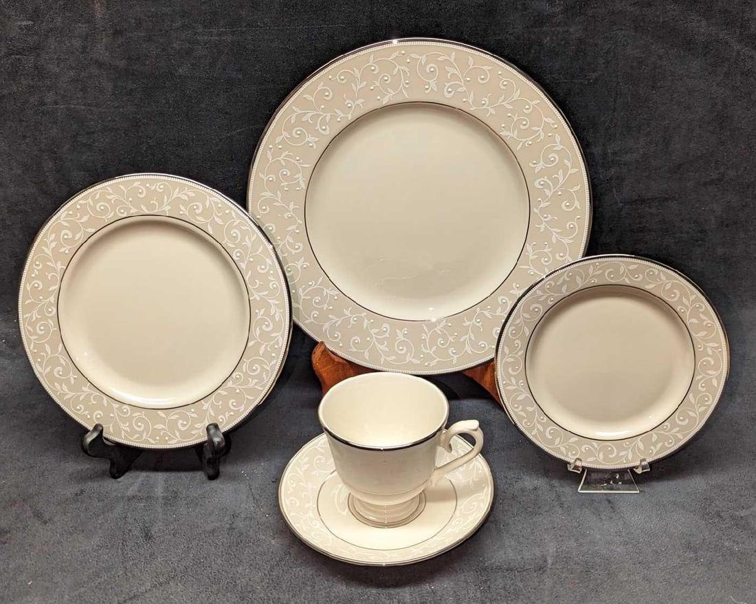 Lenox China Opal Innocence 5 Piece Place Setting: Lenox China Opal Innocence 5 Piece Place Setting. This lot includes: (1) Dinner Plate. This is approx 10 3/4" x 10 3/4" x 3/4". (1) Salad Plate. This is approx 8 1/4" x 8 1/4" x 1