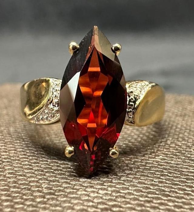 14k Gold 2.7 Ct. Marquise Garnet Cocktail Ring: This piece of jewelry has been tested and researched prior to listing. Please view all our pictures they are part of our description. DETAILS: Metal - 14k Gold Color - Yellow Gold Stones - Garnet (ma
