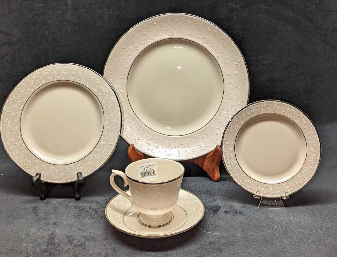 Lenox China Opal Innocence 5 Piece Place Setting E: Lenox China Opal Innocence 5 Piece Place Setting E. This lot includes: (1) Dinner Plate. This is approx 10 3/4" x 10 3/4" x 3/4". (1) Salad Plate. This is approx 8 1/4" x 8 1/4" x