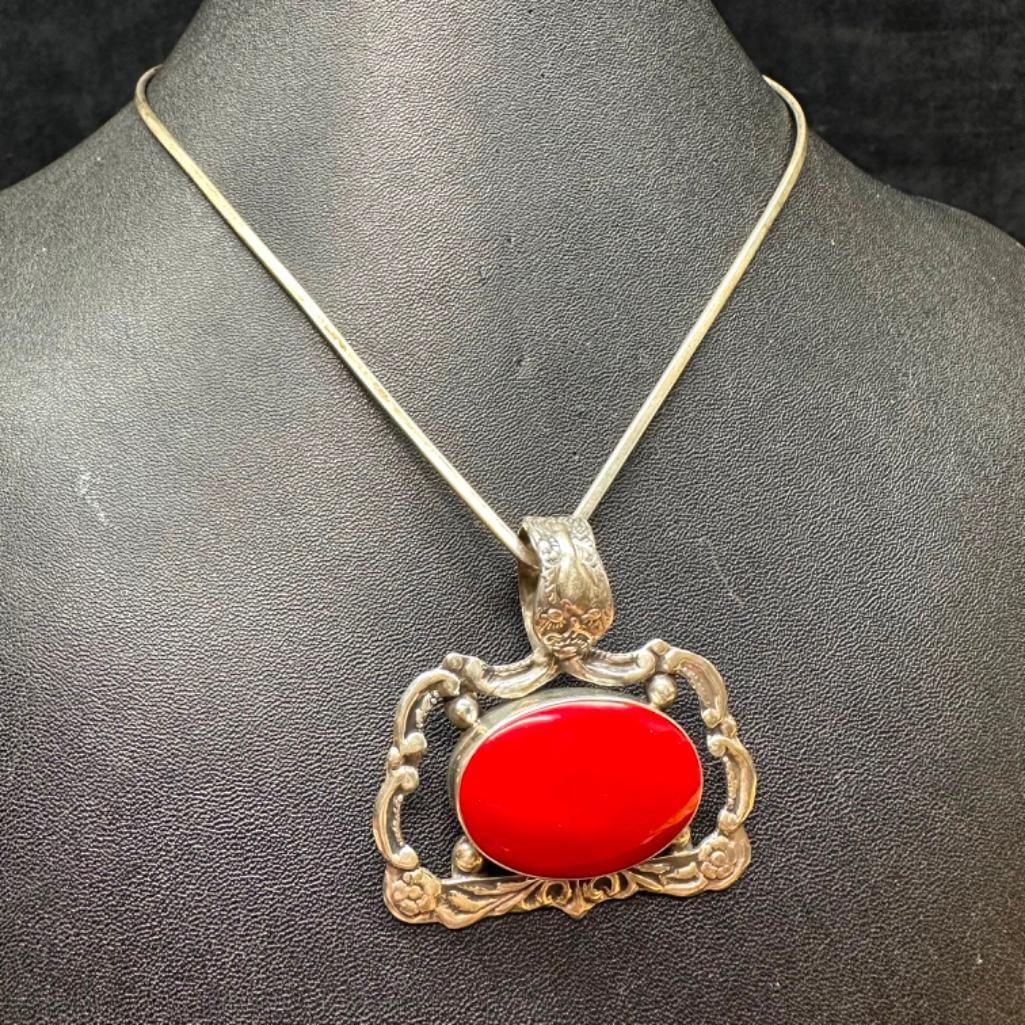 Sterling Red Stone Pendant Wire Necklace: This piece of jewelry has been tested and researched prior to listing. Please view all our pictures they are part of our description. DETAILS: Metal - Sterling Silver Color - Silver Stones - u/k red s