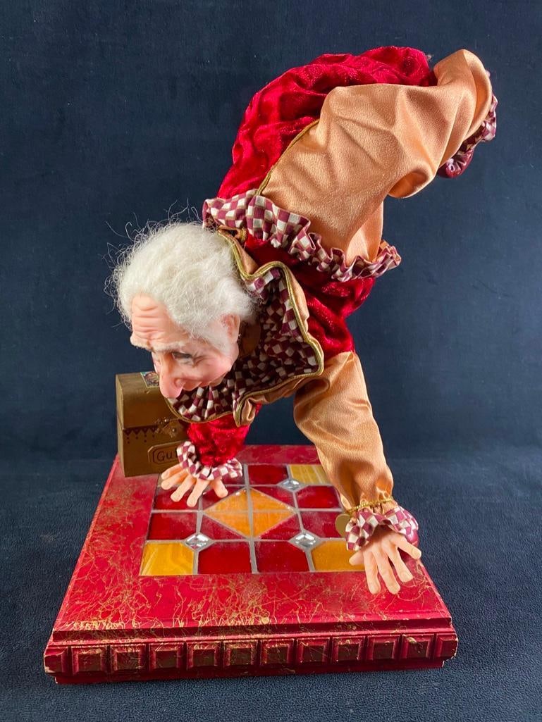 Jacqueline Kent Porcelain Jester "Guido": Jacqueline Kent Porcelain Jester "Guido" 2003 figure of a jester by Jacqueline Kent from the Royal Jester series, with porcelain head and hands. Features a jester named Guido doing a handstand