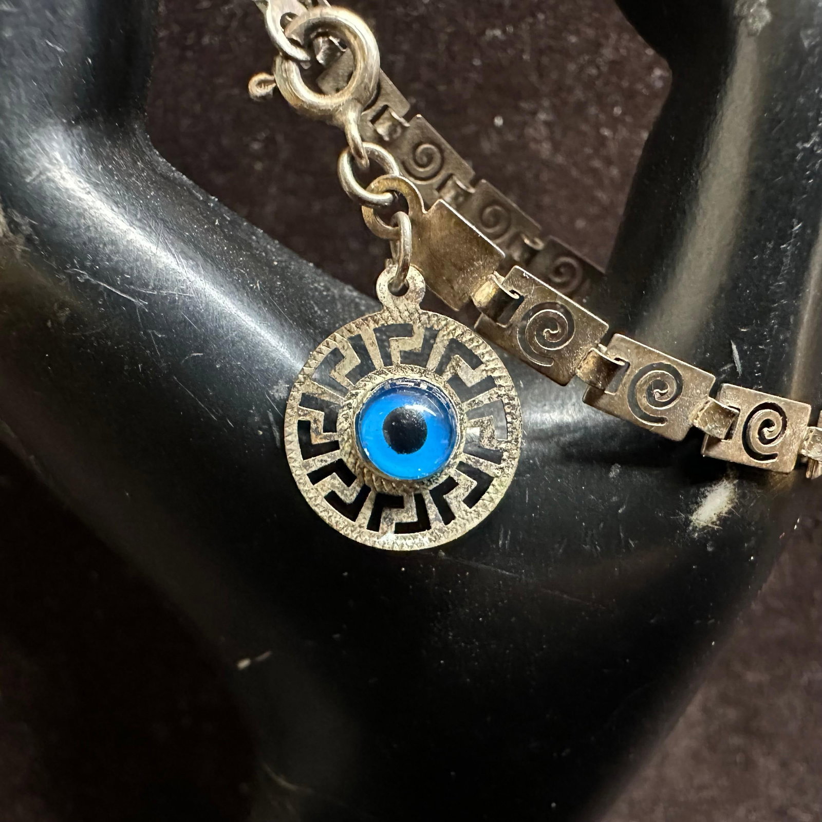 Sterling Silver Greek Key Design Bracelet with Evil Eye Charm Dangle 925: This item is in good pre-owned, previously used/displayed condition with noticeable light wear and surface scratches. Please reference all photos for full details. This piece of jewelry has been teste