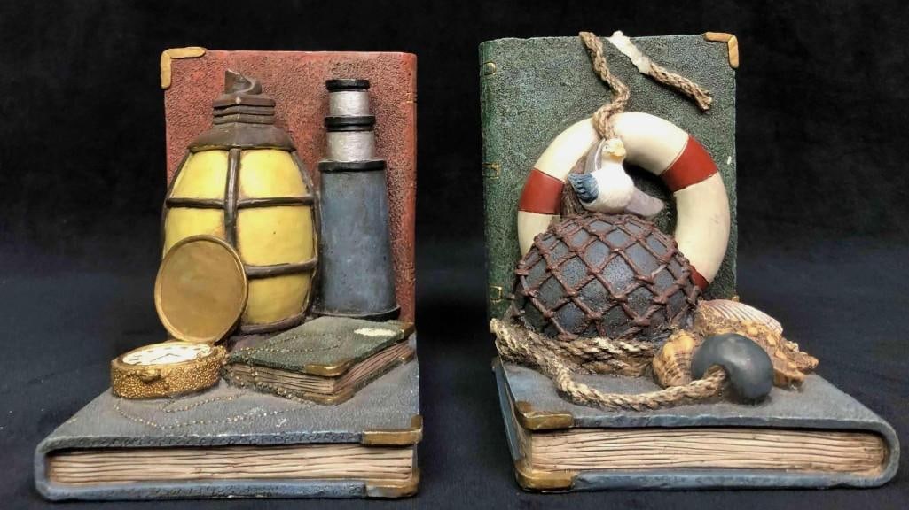 Vintage Beach Theme Book Ends: Vintage Beach Theme Book Ends. This lot contains vintage beach themed bookends from the 90s. Each book end is approx 4 3/4" x 4 1/2" and weighs about 1.75lbs each. The bookends are made of resign