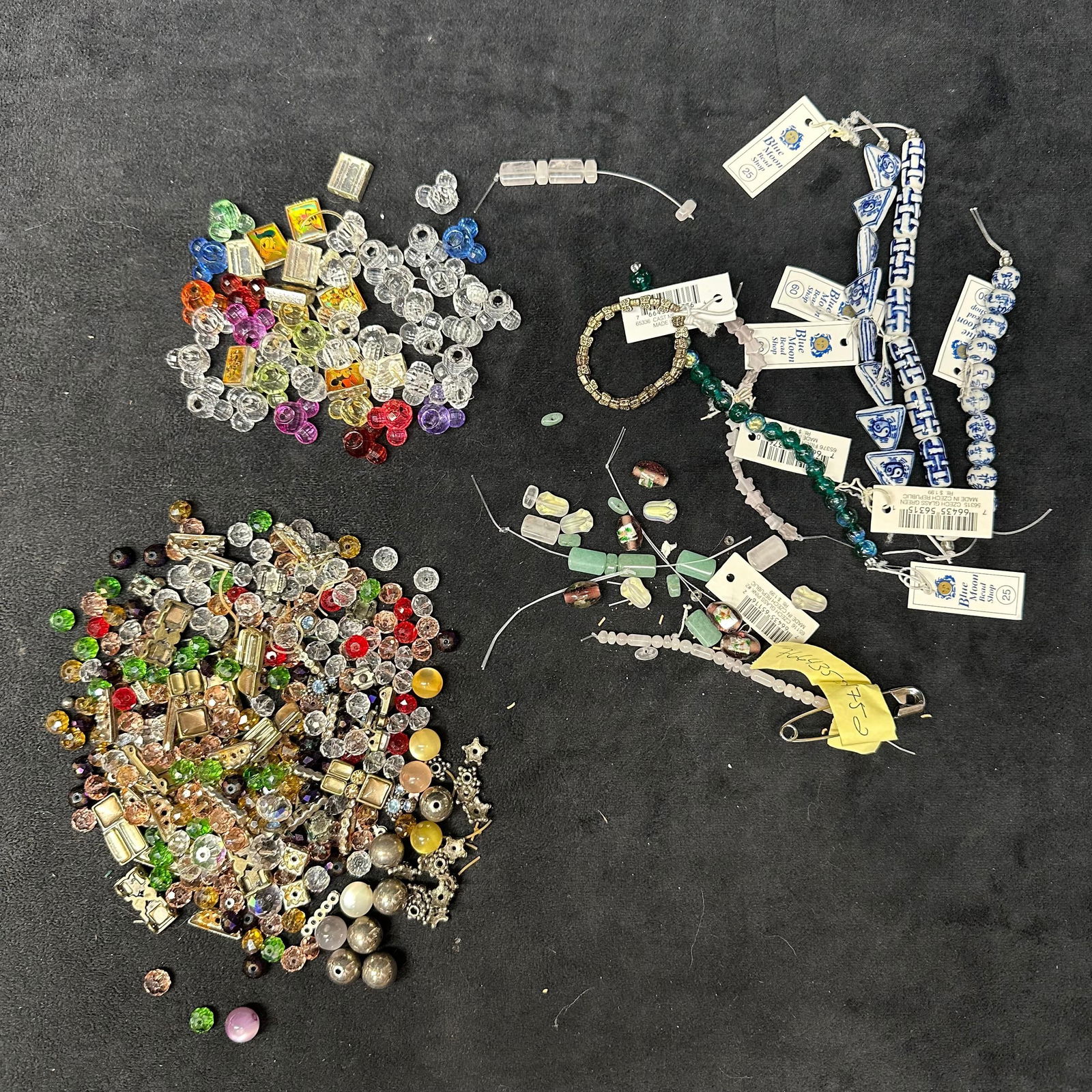 Assorted Jewelry Making Beads Glass Crystal Metal Blue Moon Strands Disney Mixed Craft Supply: Mixed lot of assorted beads and jewelry-making materials, including faceted glass, plastic, crystal, acrylic, metal spacers, and enamel accents. Several Blue Moon Beads strands are included, along wit