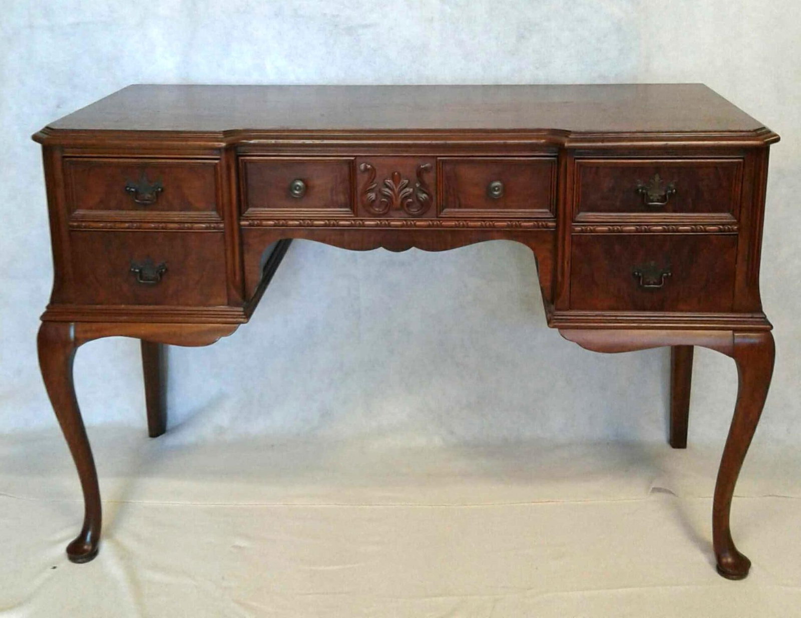 Midcentury Wooden Desk: This desk from the 1950s has some imperfections including tiny dings, and scratches, some shown in photos. Measures approximately 30.5"H x 46"W x 19"D. There are no other signs of defects or quality i