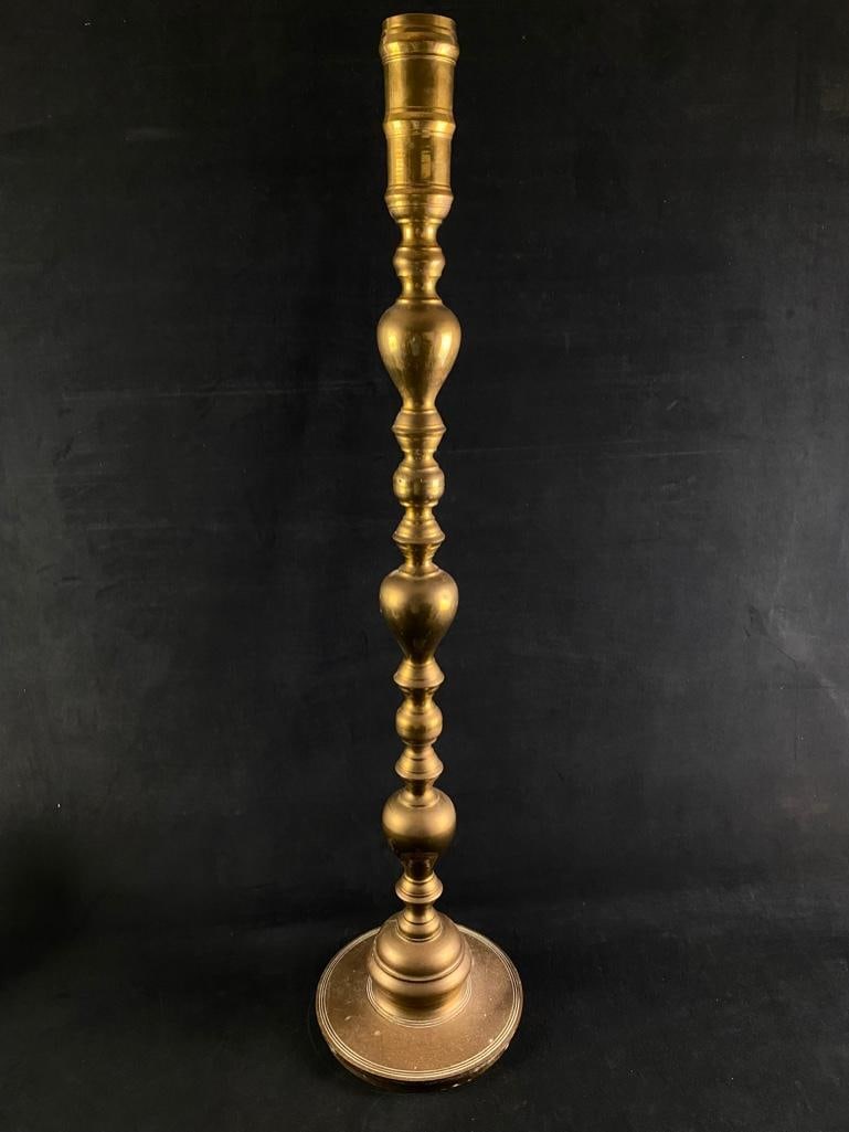 Vintage Moroccan Brass Floor Candleholder: Vintage Moroccan Brass Floor Candleholder Brass candleholder from Morocco, with arabesque designs etched into the brass. Sits on the floor, and has built in drip pan to catch any wax. Likely from the 