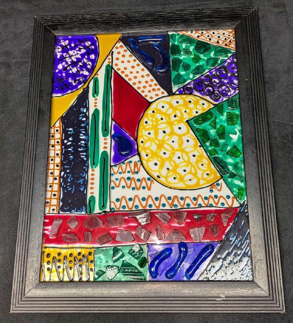Framed Colorful Fused Glass Art: Framed Colorful Fused Glass Art. This was signed by the artist on the bottom right corner. "VA'3". The framed glass art is approx 12" x 3/4" x 15" and it weighs 1.86lb. The frame has some markings and