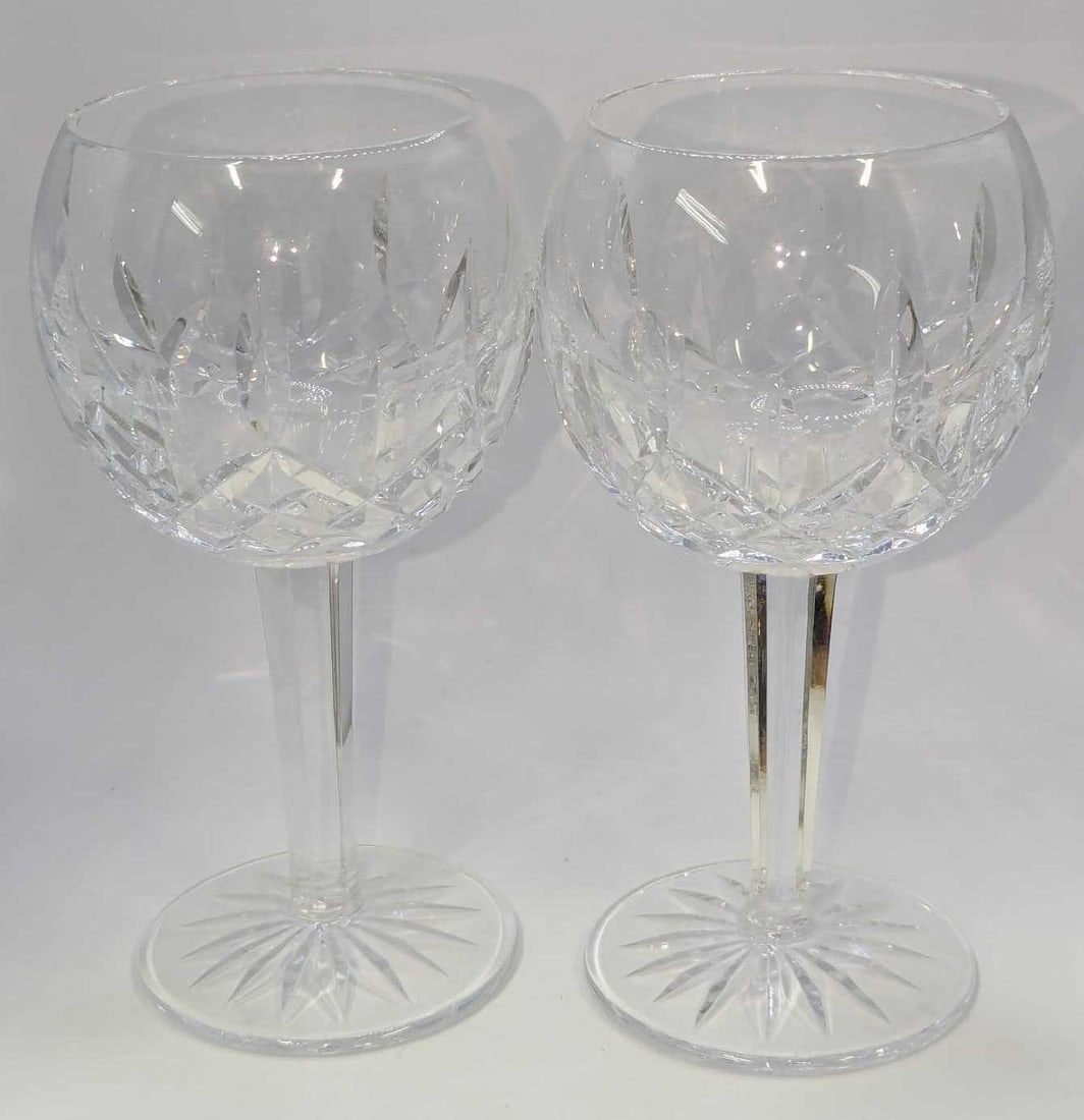 2 Waterford Crystal Lismore Balloon Wine Glasses D: 2 Waterford Crystal Lismore Balloon Wine Glasses D. Each is approx 4"x 4" x 7" and the total weight is 1.91lb. The glasses have no chips or cracks. Please reference all of the photographs as they are