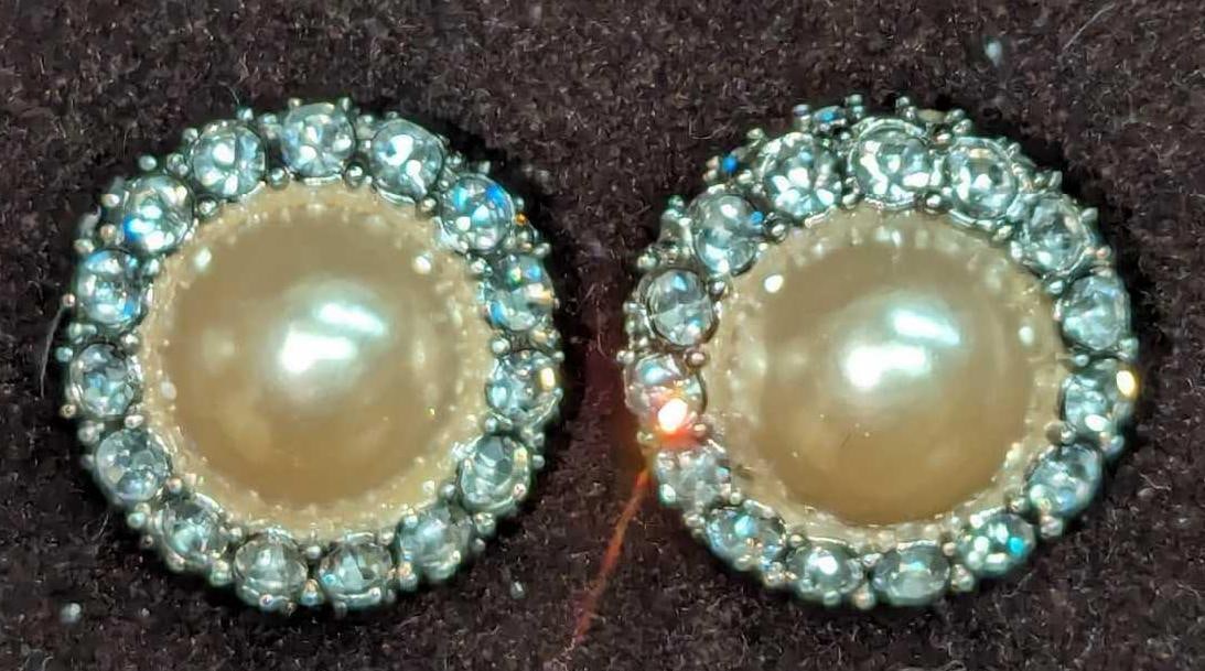 Kenneth Jay Lane Rhinestone Pearl Earrings Clip On: Kenneth Jay Lane Rhinestone Pearl Earrings Clip On. Rhinestones with large faux pearls. Each is approx 7/8" x 3/4" x 7/8". It comes in a bag that is approx 2" x 3/4" x 3 1/2" and it weighs 0.04lb.&nbs