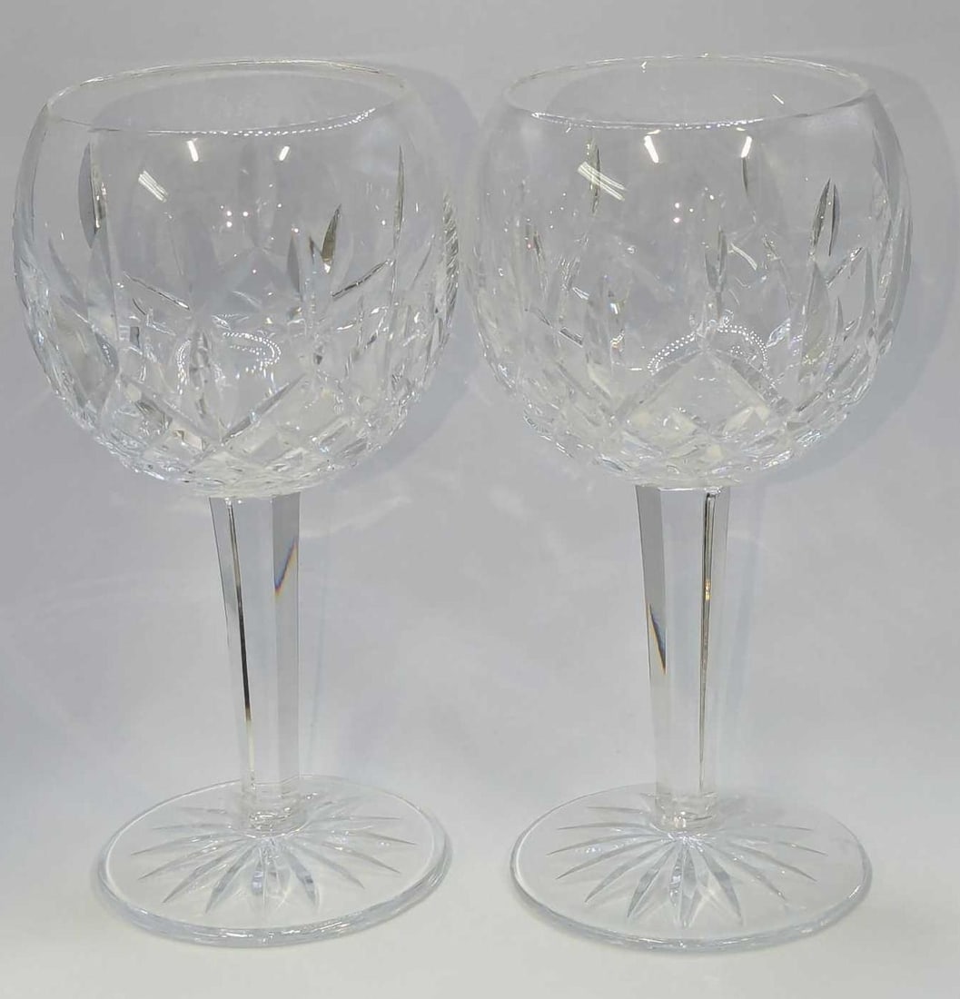 2 Waterford Crystal Lismore Balloon Wine Glasses G: 2 Waterford Crystal Lismore Balloon Wine Glasses G. Each is approx 4"x 4" x 7" and the total weight is 1.74lb. The glasses have no chips or cracks.