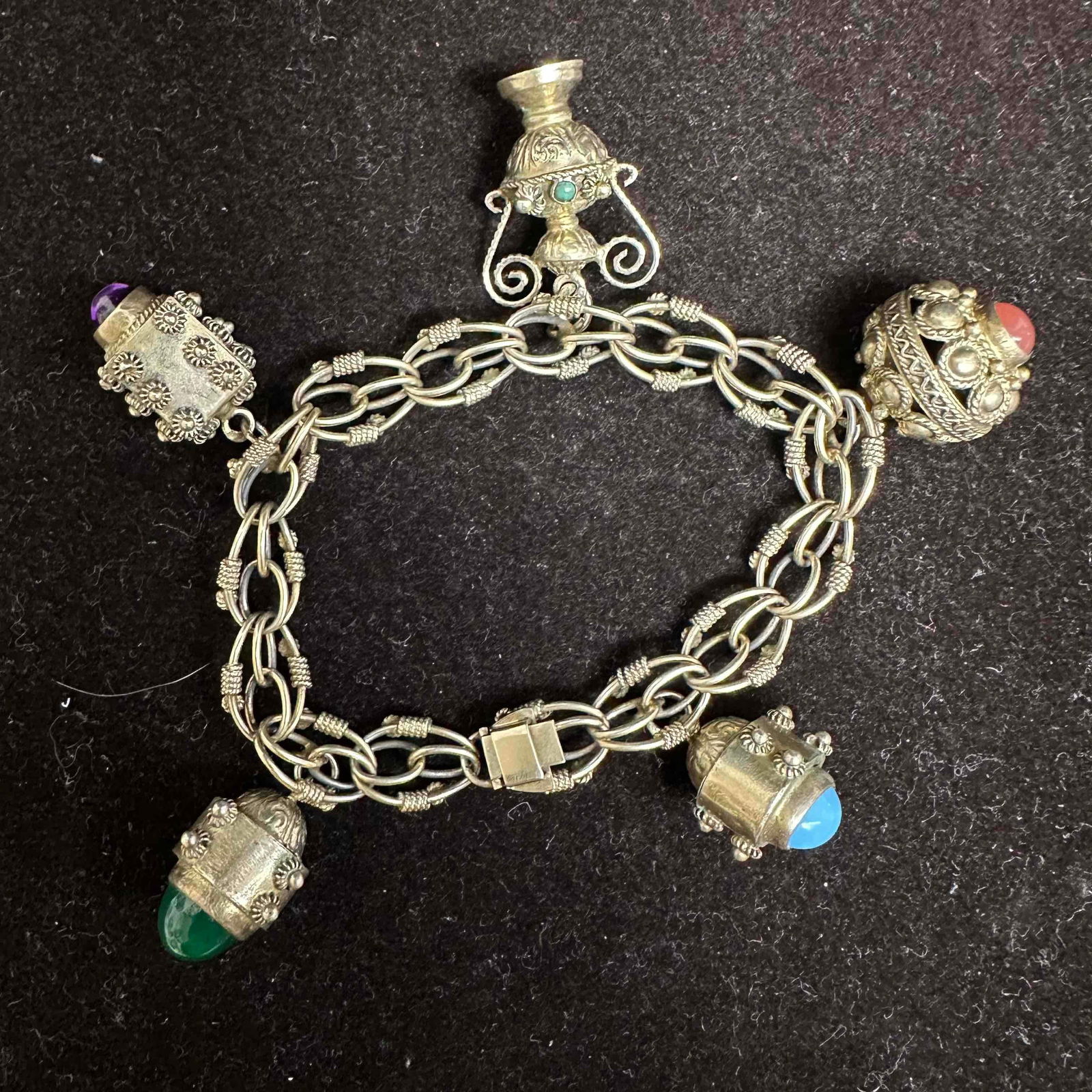 Gold Tone 835 Silver Interlocking Chain Dangle Charm Bracelet: This item is in good pre-owned, previously used/displayed condition with noticeable light wear, and surface scratches. Please reference all photos for full details. This piece of jewelry has been test
