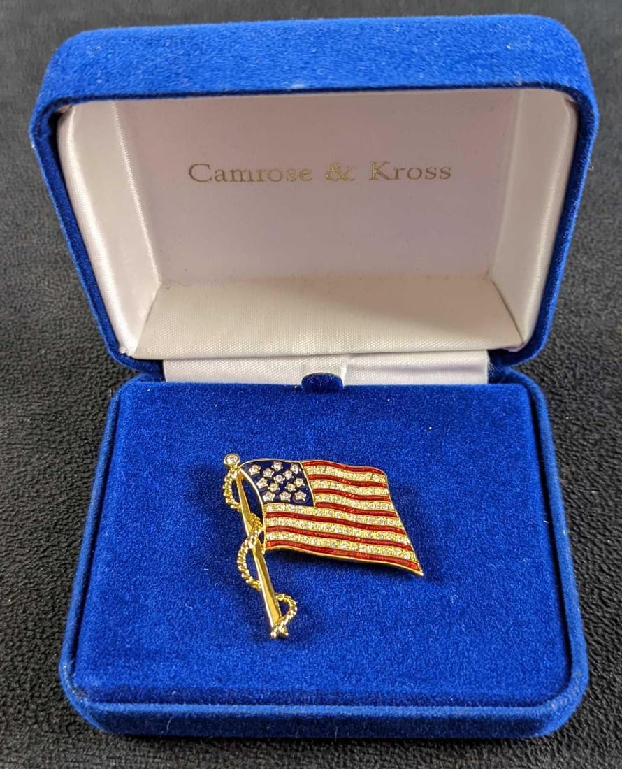 US Flag Brooch Camrose & Kross Kennedy Collection: Pictured is a replica of an American Flag Brooch Jackie Kennedy was gifted by Governor General Vanier in 1961. This beautiful piece was made by Camrose & Kross. The brooch is an unfurled flag pin in g