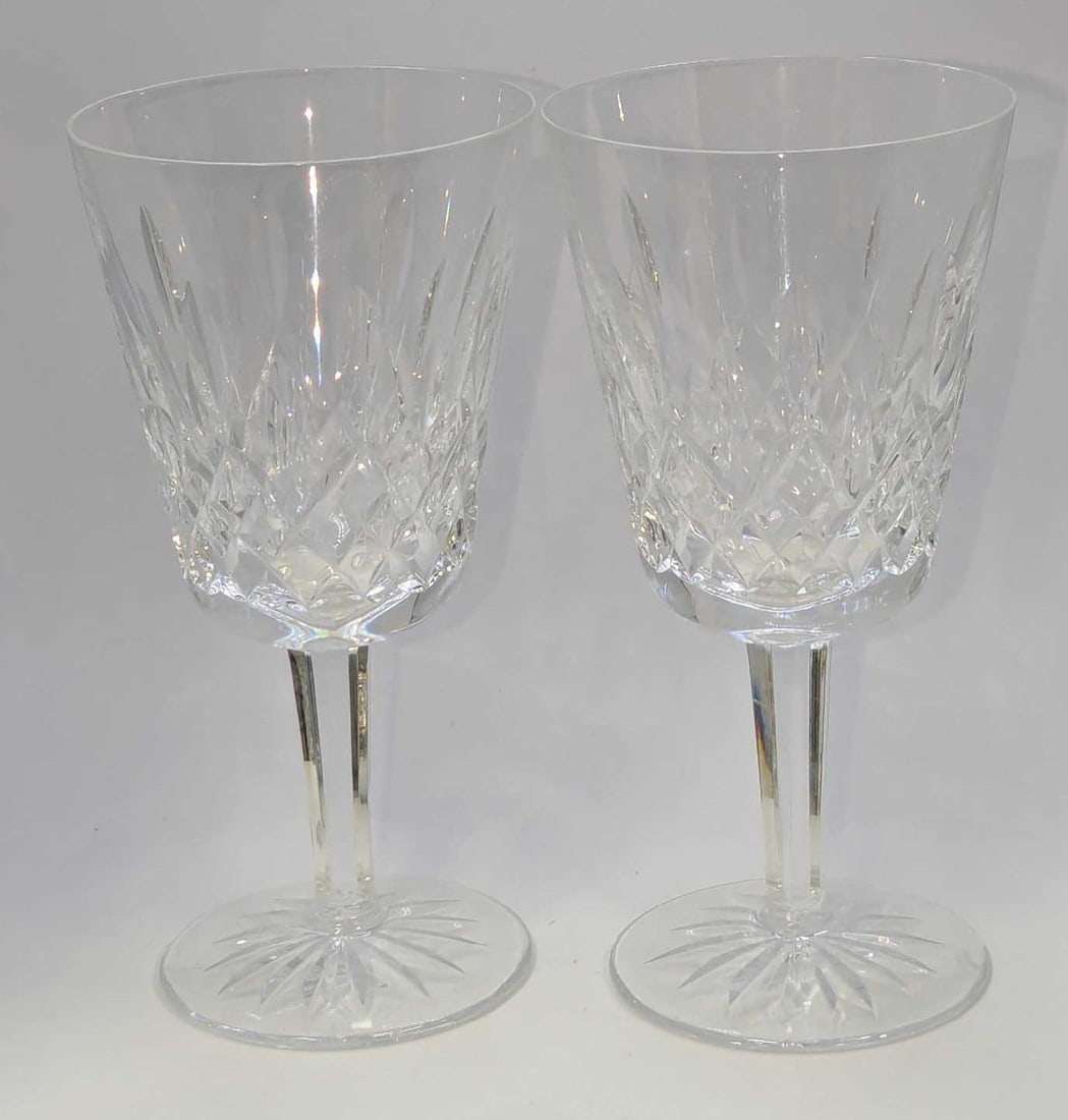 2 Waterford Crystal Lismore White Wine Glasses B: 2 Waterford Crystal Lismore White Wine Glasses B. Each is approx 3 3/8"x3 3/8" x 6 7/8" and the total weight is 1.79lb. The glasses have no chips or cracks.