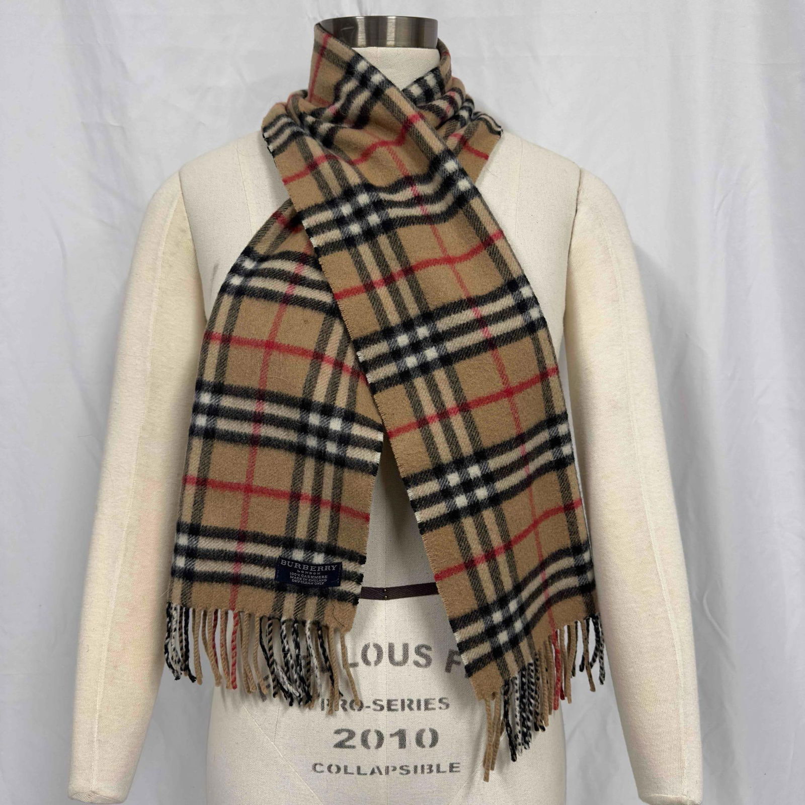 Burberry Classic Check Plaid Rectangle Scarf 100% Cashmere Shawl Wrap: Burberry Classic Check Plaid Rectangle Scarf 100% Cashmere Shawl Wrap. Made in England. 100% Cashmere. Burberry London. Light wear and stains, overall good condition. This item is in good pre-owned, p