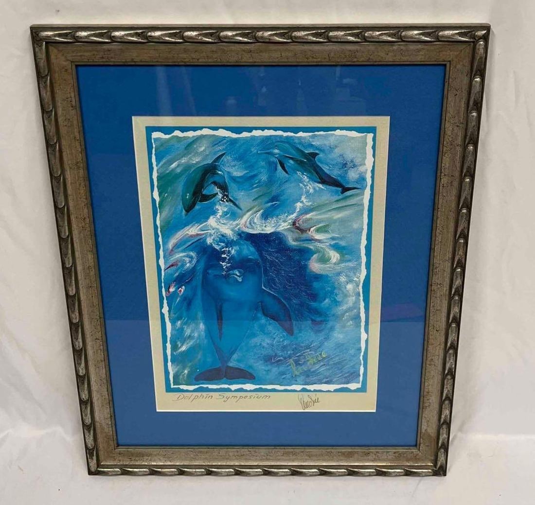 Signed & Framed Print "Dolphin Symposium" (JB223J): This lot contains a Signed & Framed Print "Dolphin Symposium". The frame is approx 24" x 19 1/2". Total weight is 4.4lbs. Overall the framed print is in good used condition with no noticeable flaws. P