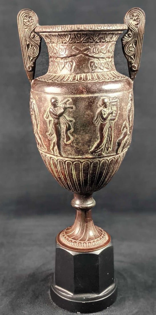 Vintage Greek Style Bronze Repo Vase X9: Vintage Greek Style Bronze Vase. Its maker and date of creation are unknown. Is approx 6 1/4" x 5 1/2" x 16" and weighs 8lbs. The bronze vase is in a good, vintage condition with wear and small scratc
