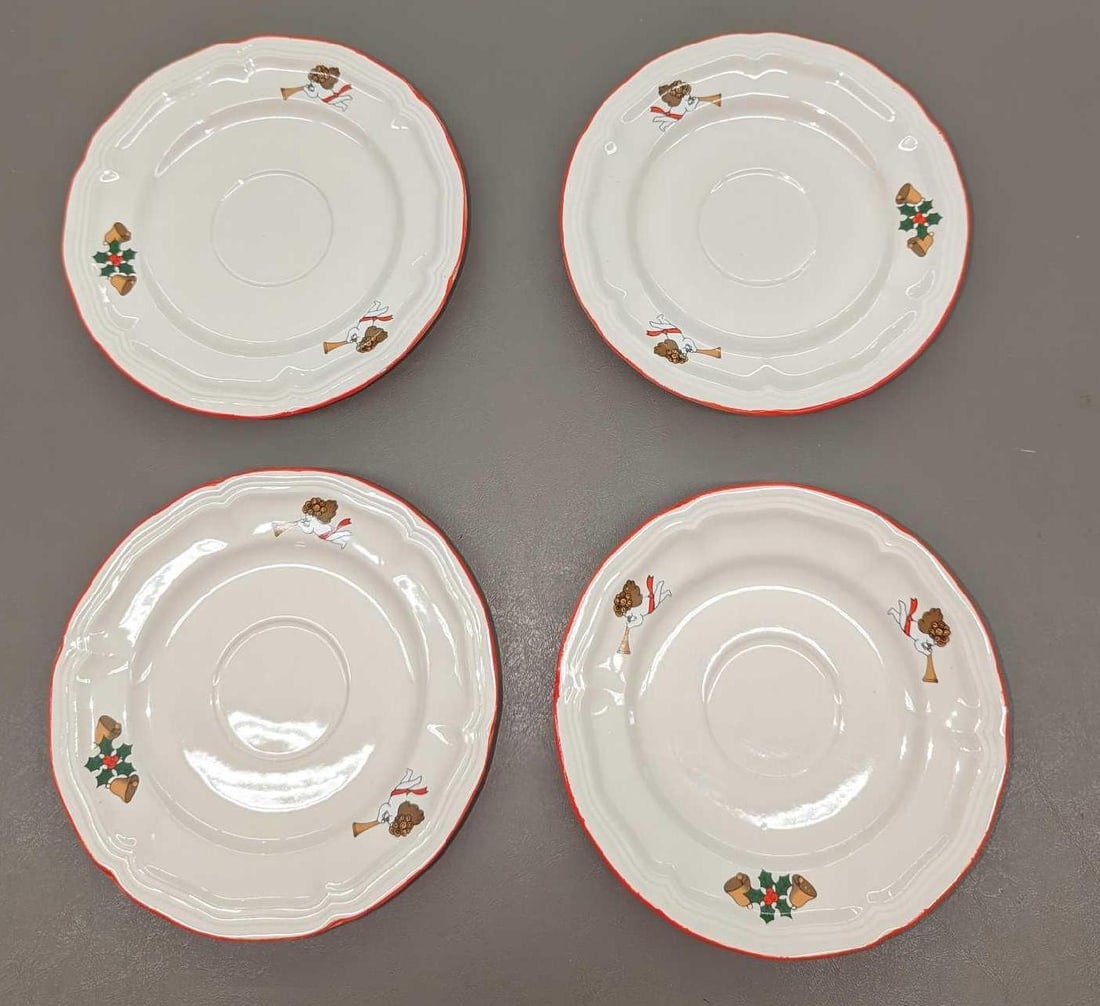 4 Retired Jamestown China Joy Of Christmas Saucers: 4 Retired Jamestown China Joy Of Christmas Saucers. Each is approx 6 1/4" x 6 1/4" x 3/4" and the total weight is 1.83lb. The saucers have no chips or cracks.