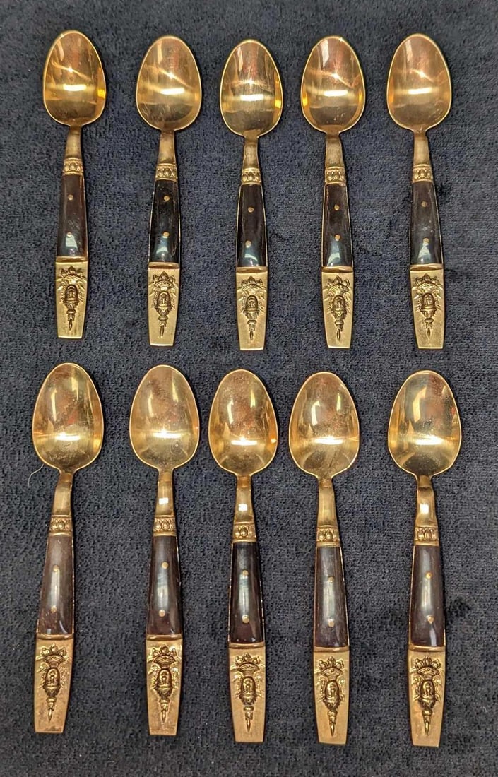 10 Vintage Thailand Brass Buddha Demitasse Spoons: 10 Vintage Thailand Brass Buddha Demitasse Spoons. Each is approximately 7/8" x 4 1/2" x 1/8" and it weighs 0.38lb. The spoons have some wear.
