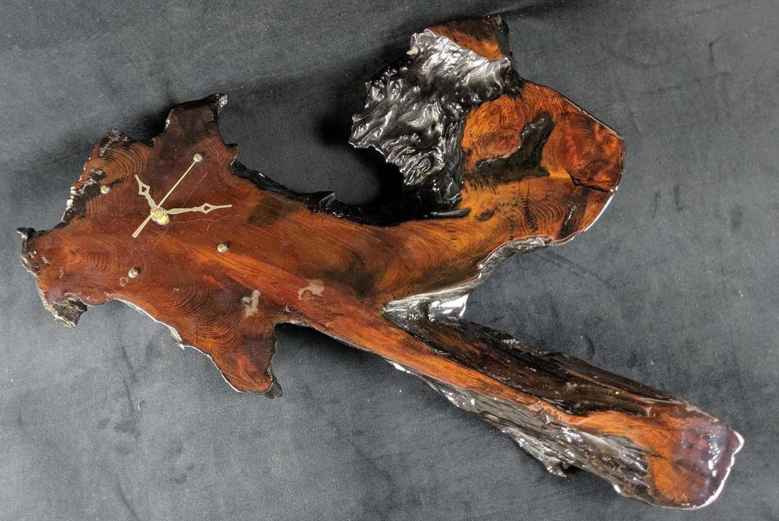 Unique Salvaged Decorative Redwood Handmade Clock: This is an hand-carved redwood clock. It had been carved and applied with acrylic. This is approx 25" x 2" x 18. The clock works, but the hands are a little loose and should be tightened for proper us