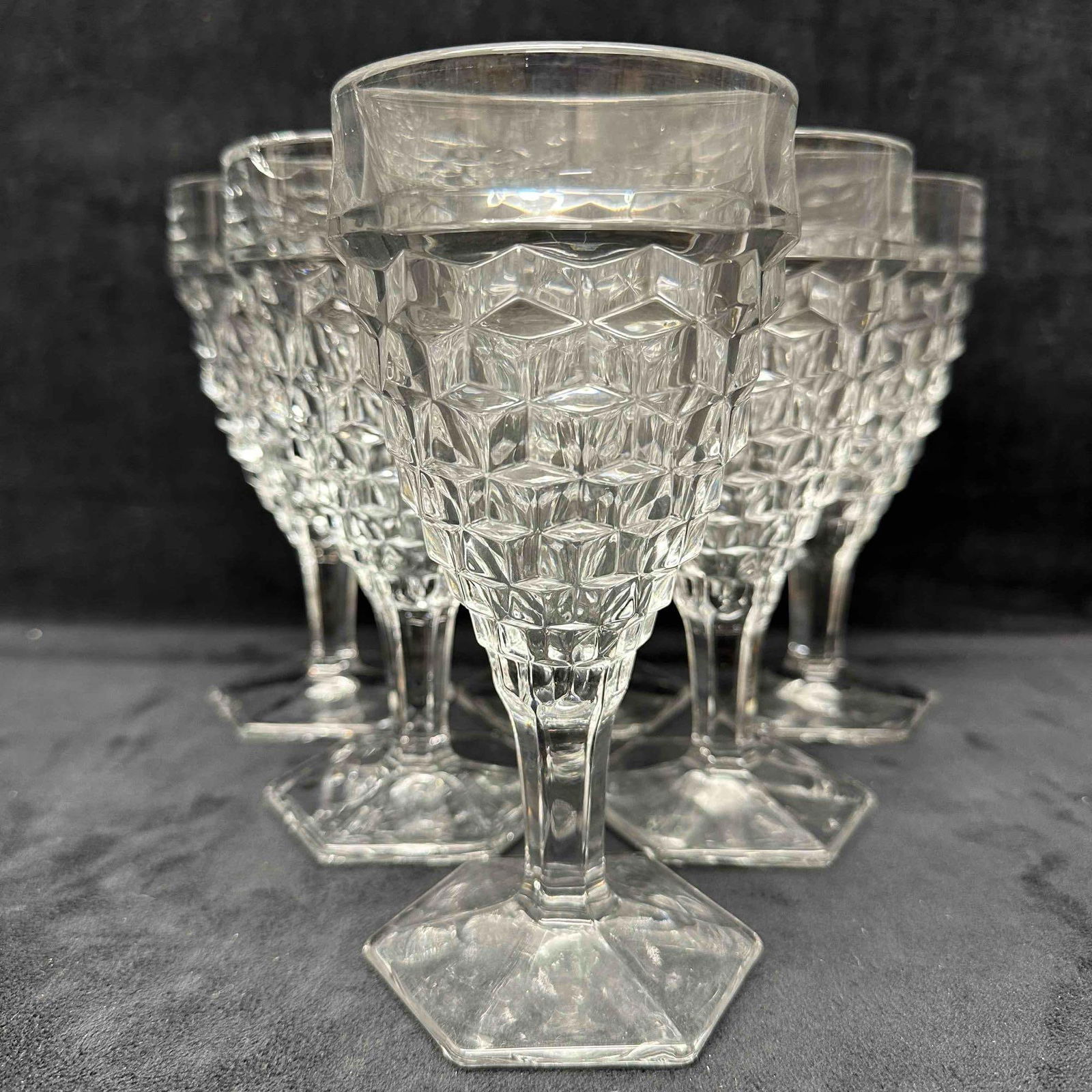 Fostoria American Cubist Glass Hex Footed Wine Glasses Water Goblet Set Six: One glass cup has a minor crack on the rim, it isn't rough, doesn't effect drinking. No other chips, cracks, or breaks in the glass. These items are in good pre-owned, previously displayed con