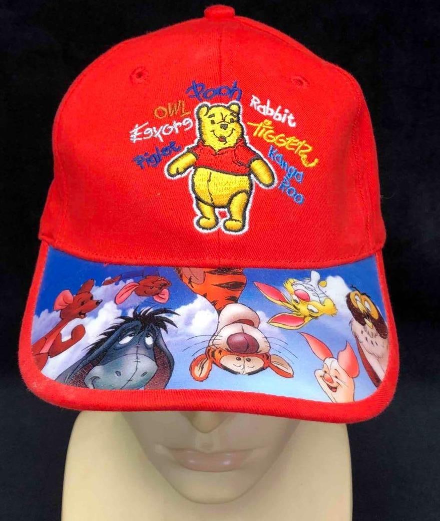 Winnie The Pooh Walt Disney World Youth Kids Strapback Hat: This lot contains a Winnie The Pooh Walt Disney World Kids hat with adjustable strap. The hat is 100% cotton exclusive from decoration and was made in Taiwan. The hat is based on the "Winnie