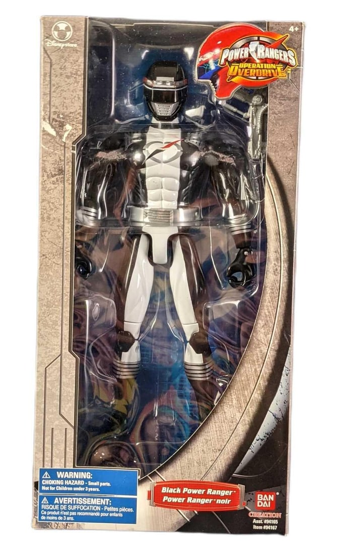 Disney Store Exclusive 11 Inch Black Power Ranger With Box: Disney Store Exclusive Power Rangers: Operation Overdrive, Black Ranger. Comes in its original box and was never removed or used. Was released by Bandai on the year 2006. The box is approx 7" x 3" x 1