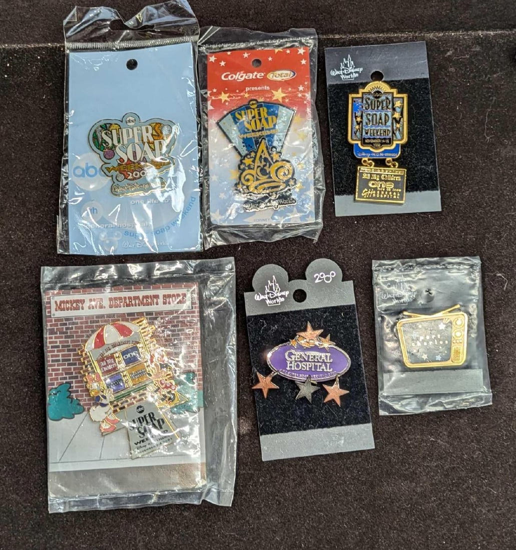 6 ABC Disney World Super Soap Weekend Pins: 6 ABC Disney World Super Soap Weekend Pins. This lot includes: (1) Sealed 2004 ABC Super Soap Weekend - Walt Disney World. This is approx 2 3/4" x 1/8" x 5". (1) Sealed Colgate ABC Super S