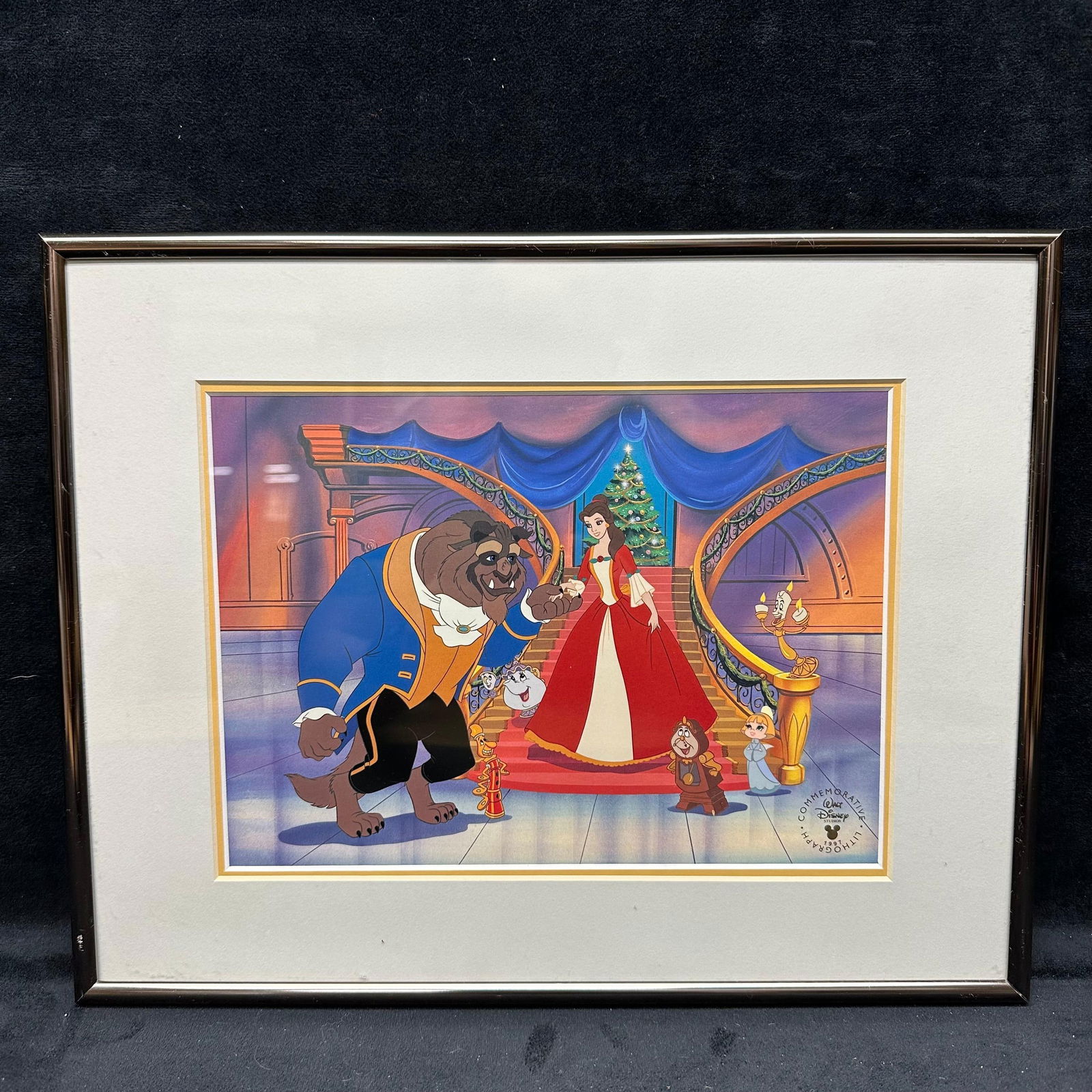 Beauty and the Beast Disney 1997 The Enchanted Christmas Commemorative Lithograph with COA Framed: Framed Disney Studios commemorative lithograph from 1997 featuring Belle, Beast, and characters from Beauty and the Beast, The Enchanted Christmas. Includes original certificate of authenticity. Litho