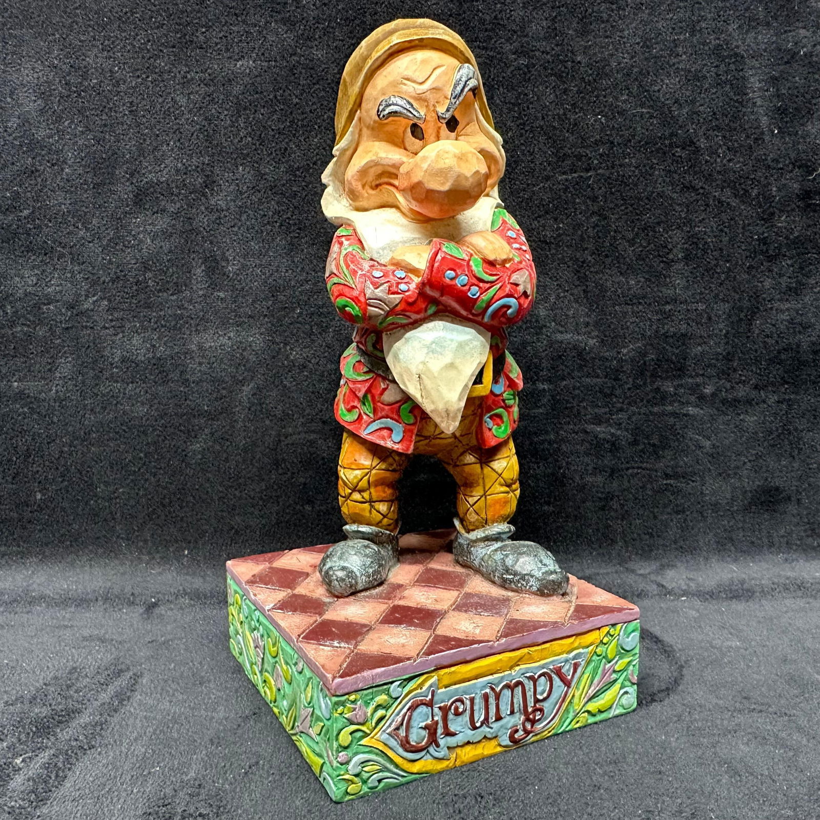 Disney Traditions Jim Shore Grumpy Figure: Disney Traditions by Jim Shore Grumpy figurine titled It’s All About the Attitude #4005216. Hand-painted resin with carved-style details and vibrant colors. Marked and dated 2005 on the base. The it