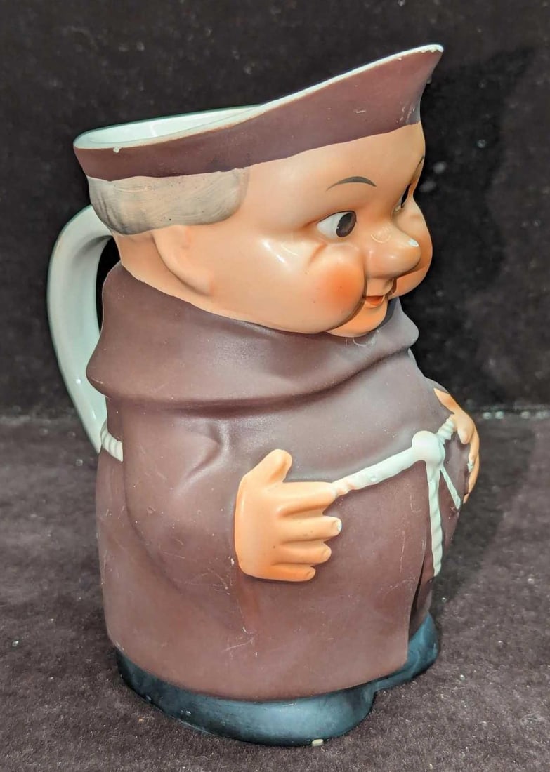 Vintage Goebel Friar Tuck Monk Small Pitcher: Vintage Goebel Friar Tuck Monk Small Pitcher. This is approx 5" x 3 1/4" x 5 1/4" and it weighs 0.57lb. The small pitcher has some chips on the nose, handle, and boots. Made in West Germany.