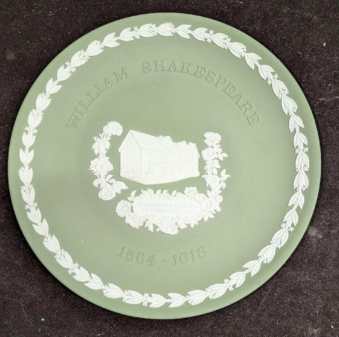 Wedgewood William Shakespeare Commemorative Plate: Wedgewood William Shakespeare Commemorative Plate. The "Sage Green" Jasperware plate is approx 8 1/8" x 3/4" x 8 1/8". It comes with the original box that is approx 8 5/8" x 1" x 8 5/8" and it weighs