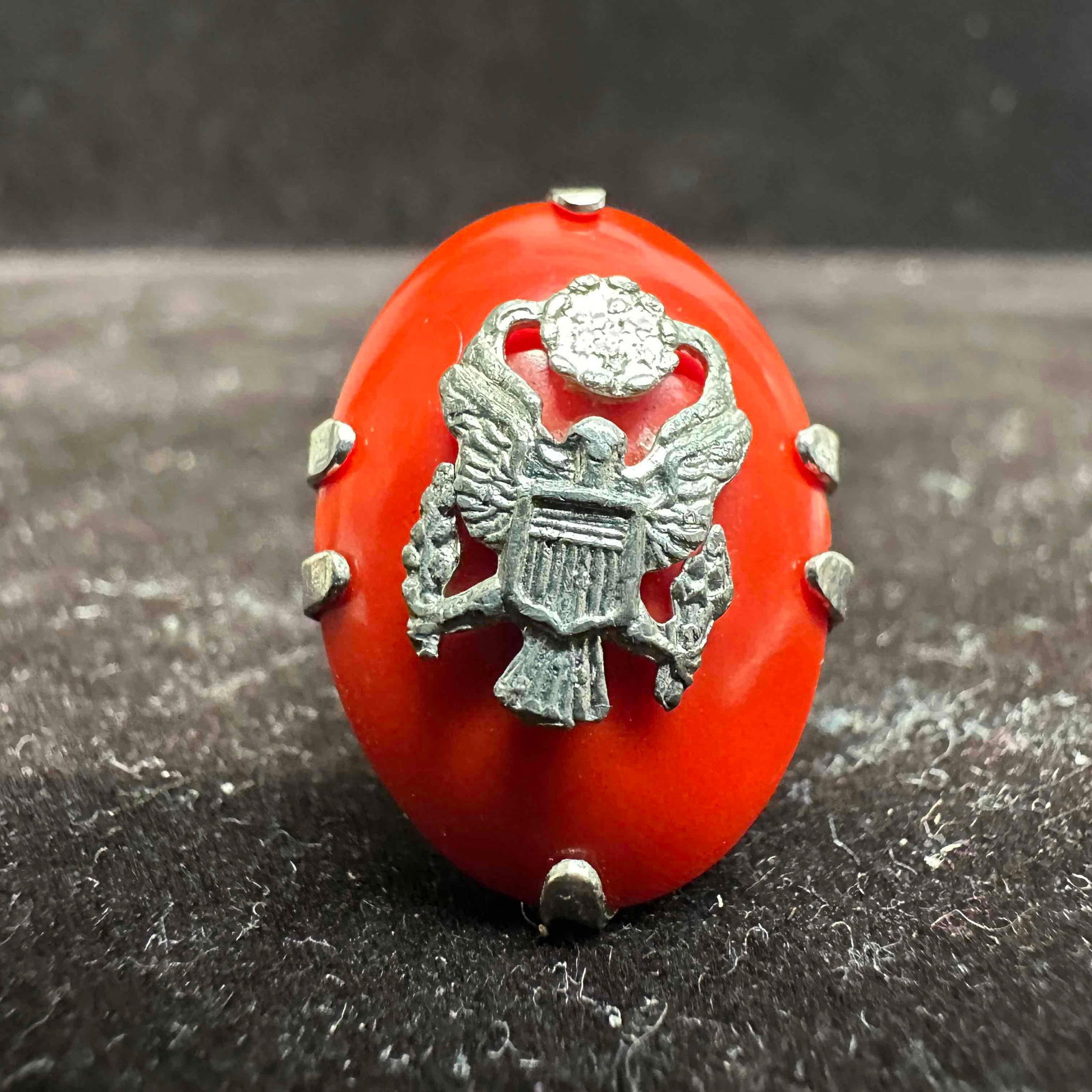 Sterling Silver Eagle Motif Red Plastic Setting Ring: This item is in good pre-owned, previously used/displayed condition with noticeable light wear, and surface scratches. Please reference all photos for full details. This piece of jewelry has been test