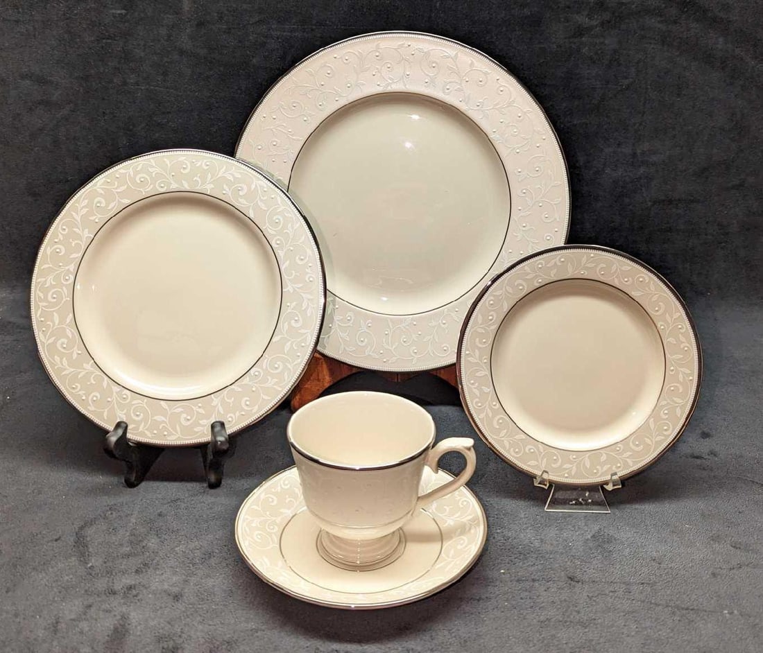 Lenox China Opal Innocence 5 Piece Place Setting B: Lenox China Opal Innocence 5 Piece Place Setting B. This lot includes: (1) Dinner Plate. This is approx 10 3/4" x 10 3/4" x 3/4". (1) Salad Plate. This is approx 8 1/4" x 8 1/4" x