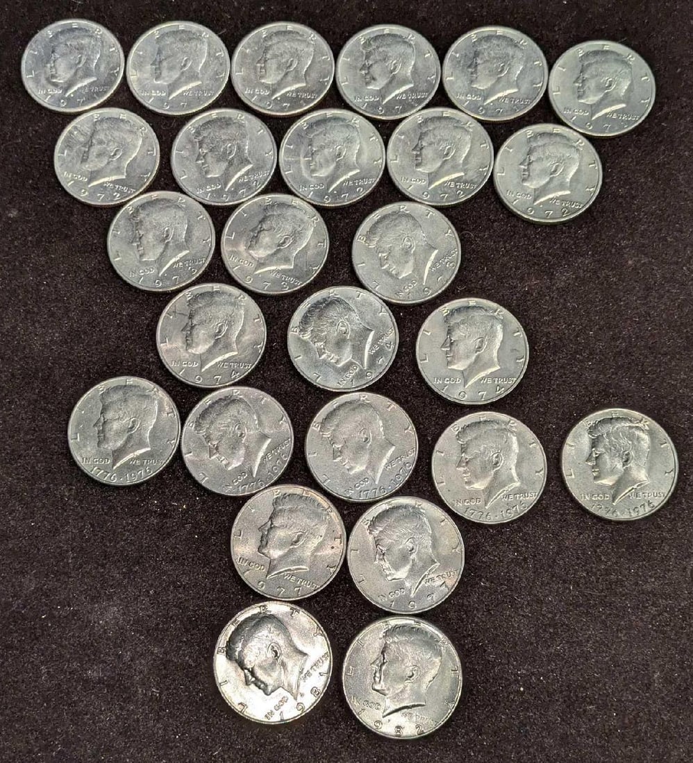 26 Vintage Kennedy Half Dollars: 26 Vintage Kennedy Half Dollars. These Kennedy Half Dollars are from the year 1971 to the year 1977 and 1981 and 1982. There are none from the year 1975. Please see the images as they are part of the 