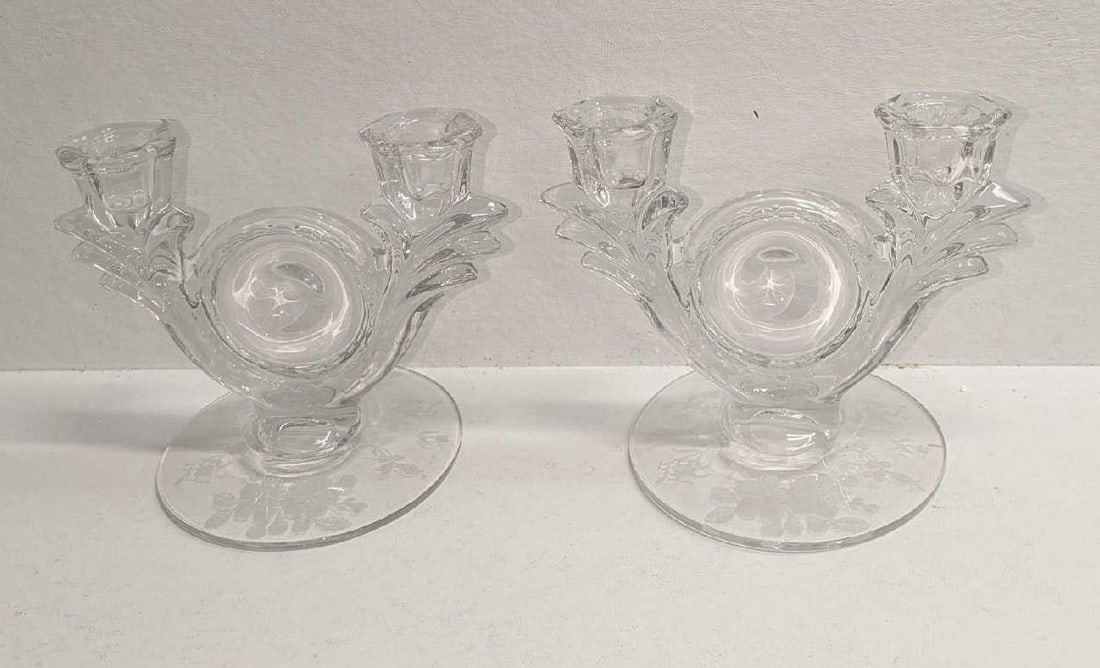 2 Glass Duncan Miller Floral Etched Double Candlestick Holders: 2 Glass Duncan Miller Floral Etched Double Candlestick Holders. Each is approx 7" x 5" x 5 5/8" and the total weight is 3.17lbs. The double candlestick holders have no chips or cracks. There are some