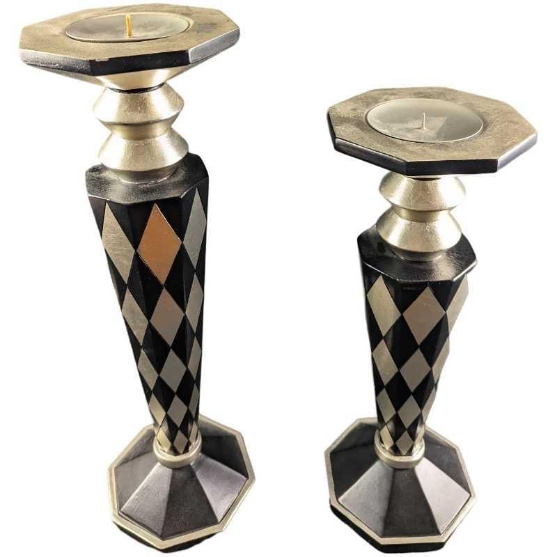 Pair Of Modern Black & Silver Wood Candlestick Holders: Pair Of Modern Black & Silver Wood Candlestick Holders. The tall candlestick holder is approx 6" x 6" x 21" and it weighs 4lbs. The smaller candlestick holder is approx 6 1/4" x 6 1/4" x 18" and it we