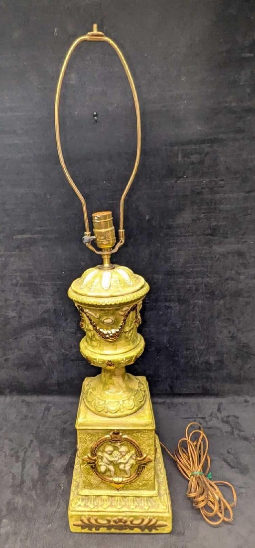 Decorative Angel Lamp: Decorative Angel Lamp. Vintage hand painted ceramic lamp with angels/cherubs. The maker and date of creation is unknown. The lamp is approx 7 1/2" x 7 1/2" x 32 5/8". Without the harp, it is approx 23