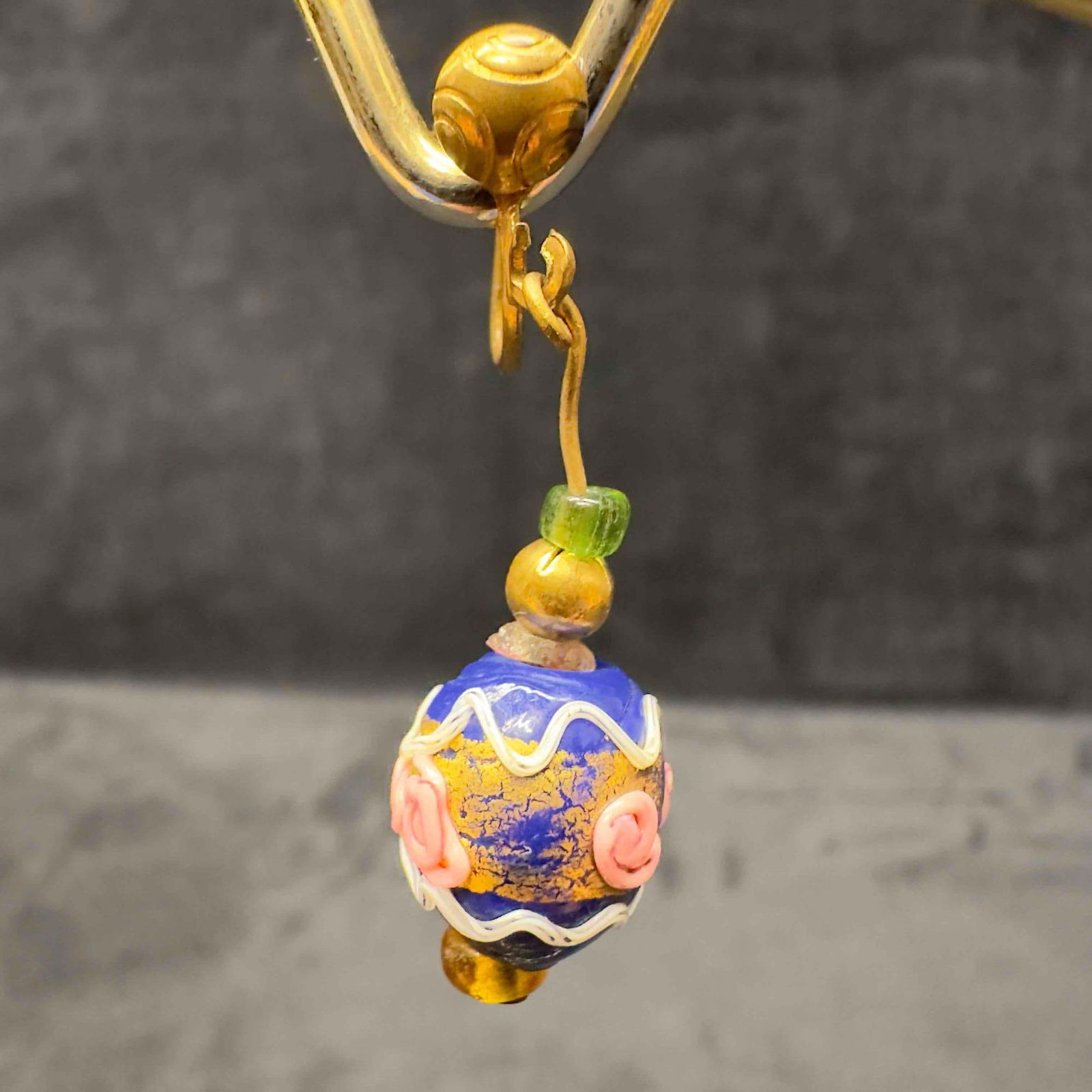 Murano Venetian Art Glass Lamp Work Dark Blue Floral Copper Round Bead Dangle Drop Earrings G85: Murano Venetian Art Glass Lamp Work Dark Blue Floral Copper Round Bead Dangle Drop Earrings G85. Earrings with dark blue glass beads with beautiful designs on each. The earrings feature copper colored
