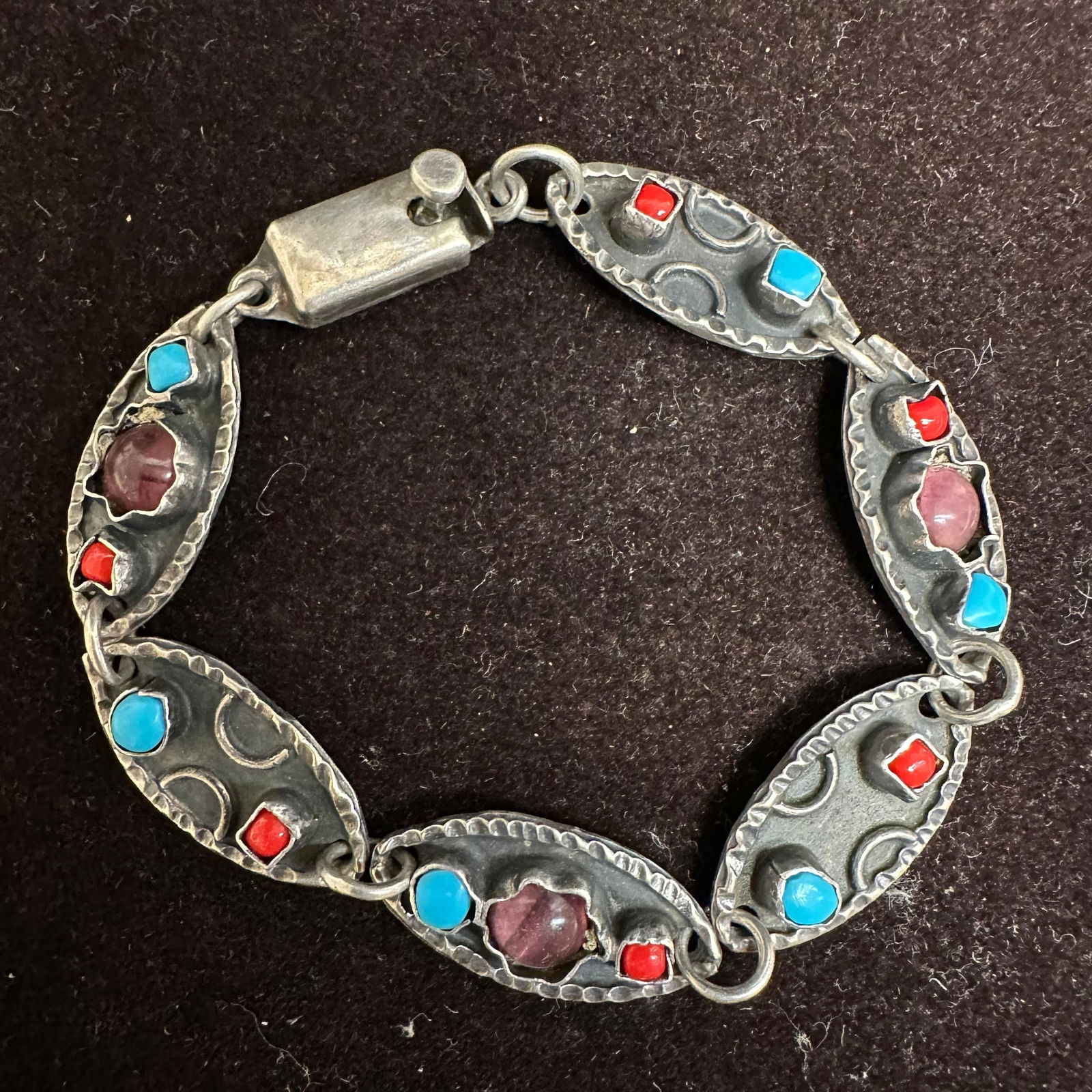 Mexico TA-196 Sterling 925 Amethyst Turquoise and Red Coral Bracelet: This item is in good pre-owned, previously used/displayed condition with noticeable light wear and surface scratches. Please reference all photos for full details. This piece of jewelry has been teste