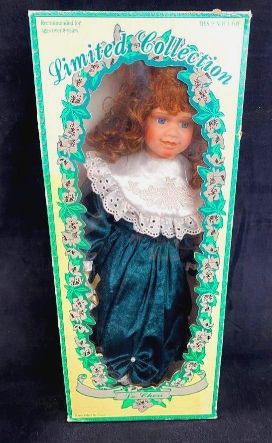 Limited Collection Porcelain 21" Doll - Ashley: Limited Collection Porcelain 21" Doll - Ashley Doll and clothes are in great shape, no known damage. This doll is made of genuine porcelain, with hand-painted face still showing bright colors and 
