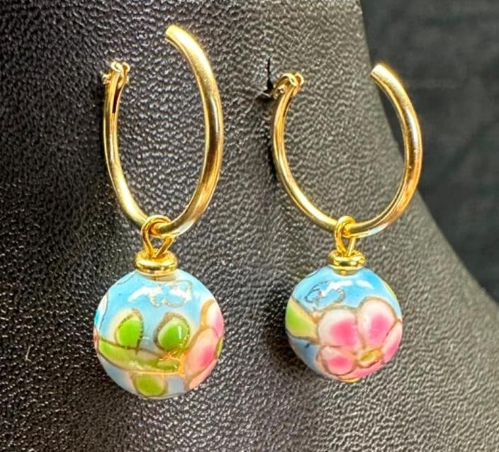 14k Gold Ceramic Earrings: This piece of jewelry has been tested and researched prior to listing. Please view all our pictures they are part of our description. DETAILS: Metal - 14k Gold Color - Yellow Gold Stones - none Hallm