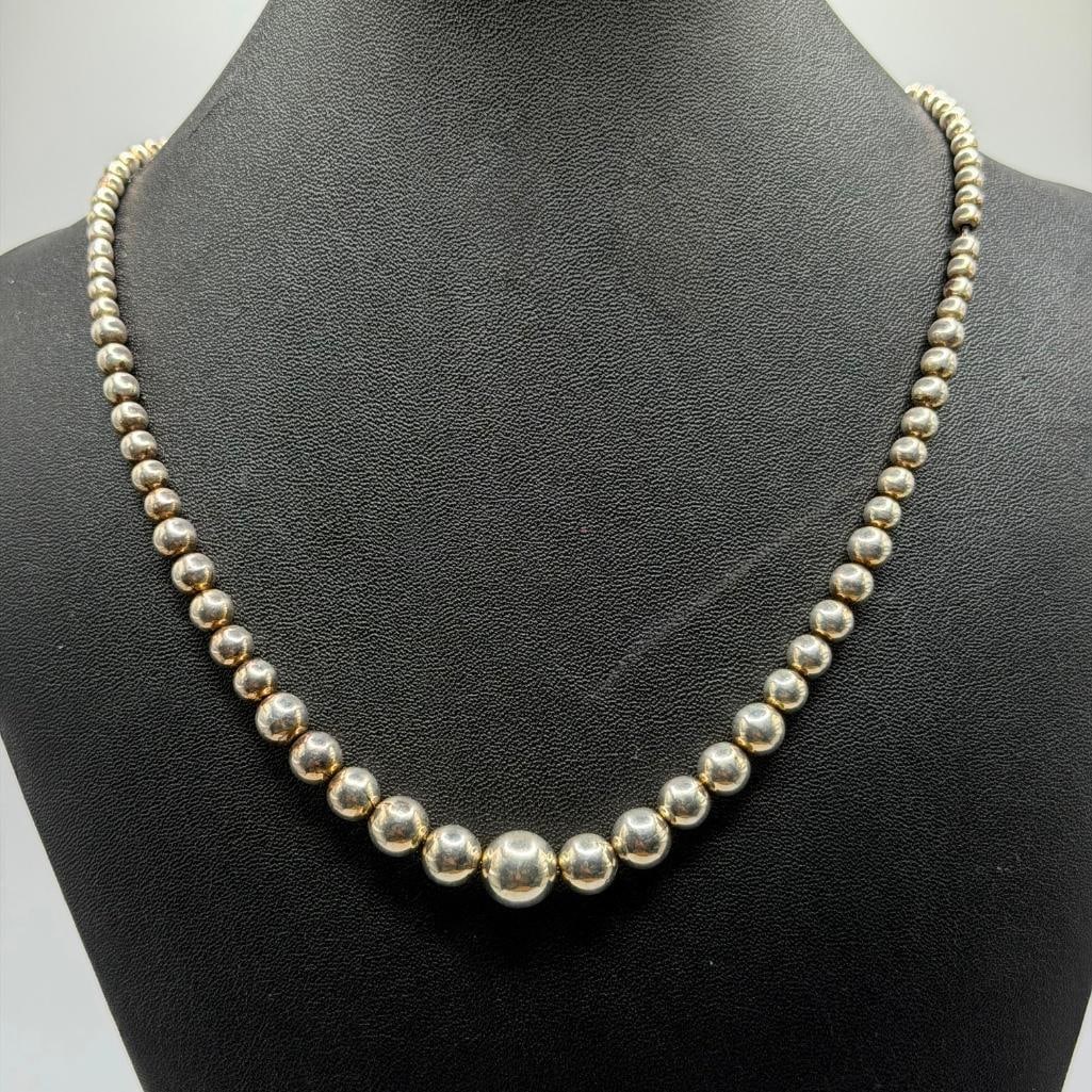 Sterling Silver Graduated Bead Necklace 17.5": This piece of jewelry has been tested and researched prior to listing. Please view all our pictures they are part of our description. DETAILS: Metal - Sterling Silver Color - Silver Stones - none Hal