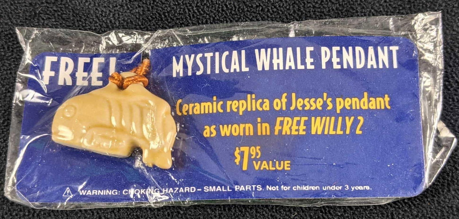 "Mystical Whale Pendant" - Ceramic Replica From The Free Willy 2 Movie: "Mystical Whale Pendant" - Ceramic Replica From The Free Willy 2 Movie. Still in its original packaging. Package is approx 5" x 2" and weighs under one pound at 0.03lb. Pendant is in a good, unused co
